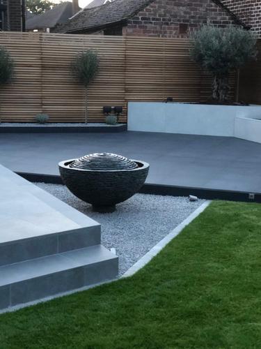 Raised 1m Grey Semi-sphere, a perfect feature in this brand new garden with such smooth clean lines.